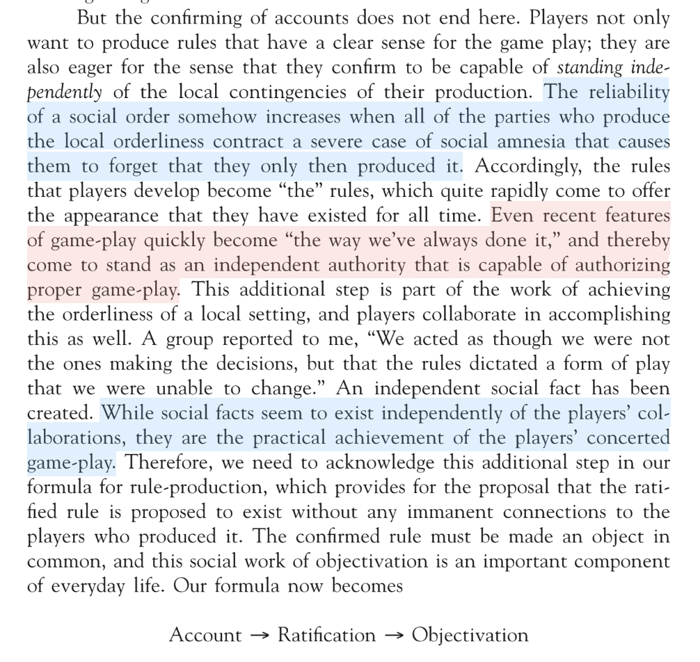 A page of text with several sentences highlighted in blue and pink. At the bottom of the page, there is a formula with three words connected by arrows.